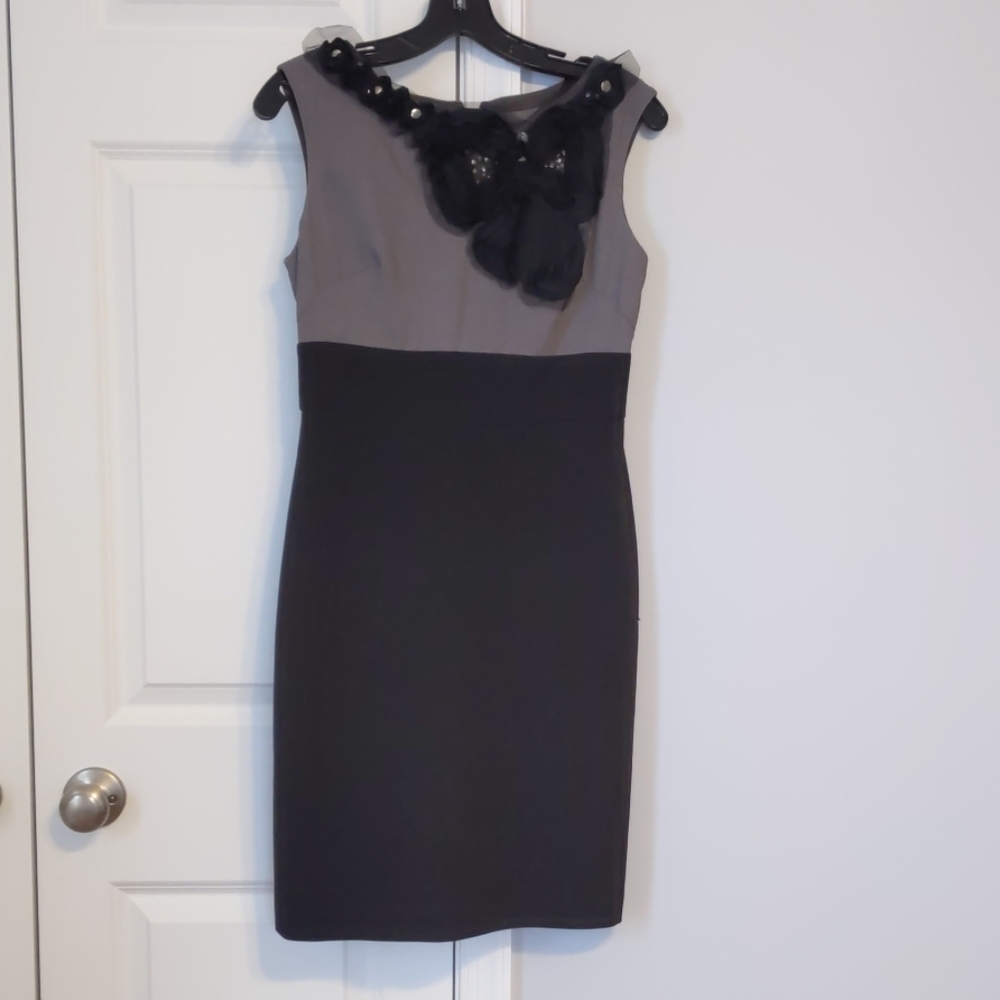 Dress with floral shoulder detail